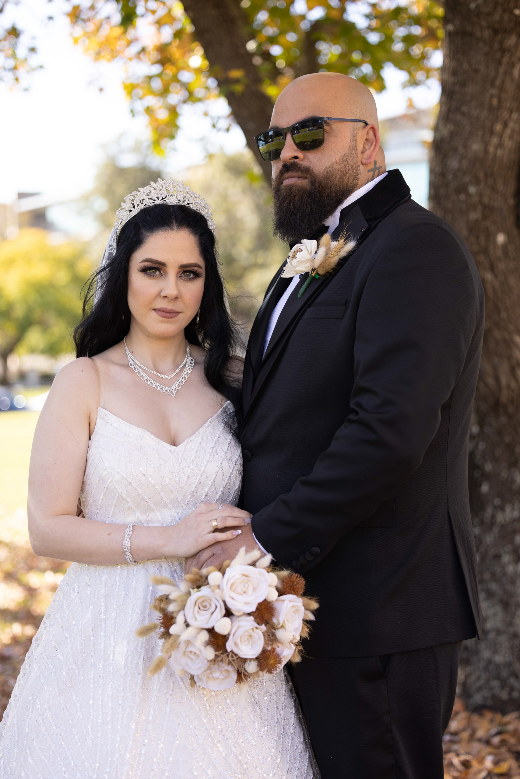 Before edit image of a bride and groom outside