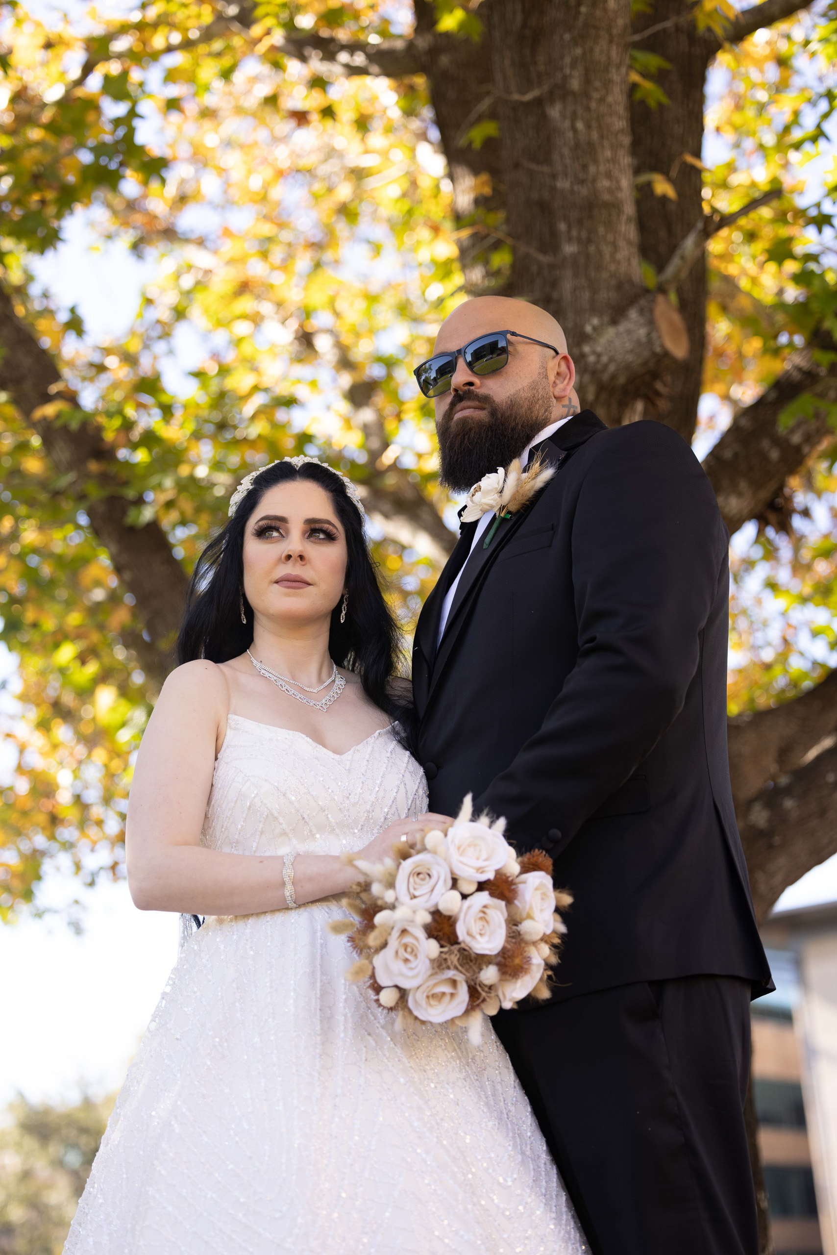 Before edit image of a bride and groom outside